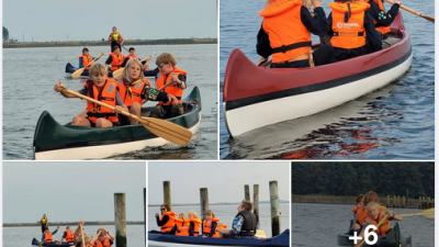 Spejder i kano på vand